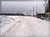 冬の富良野の一本道のフリー写真素材・無料画像