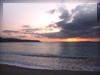オクマビーチに沈む夕日（沖縄県ヤンバル）のフリー写真素材